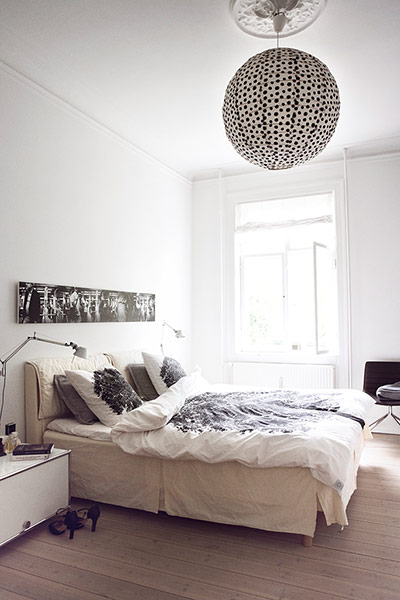 the bedroom in various shades of white